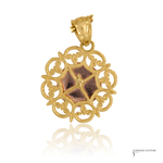 Gold pendant with intricate design on a white background
