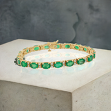 14KT Yellow Gold Emerald Tennis Bracelet 14KT Yellow Gold – 19.00 CT Natural Emeralds & 1.14 CTW Diamonds