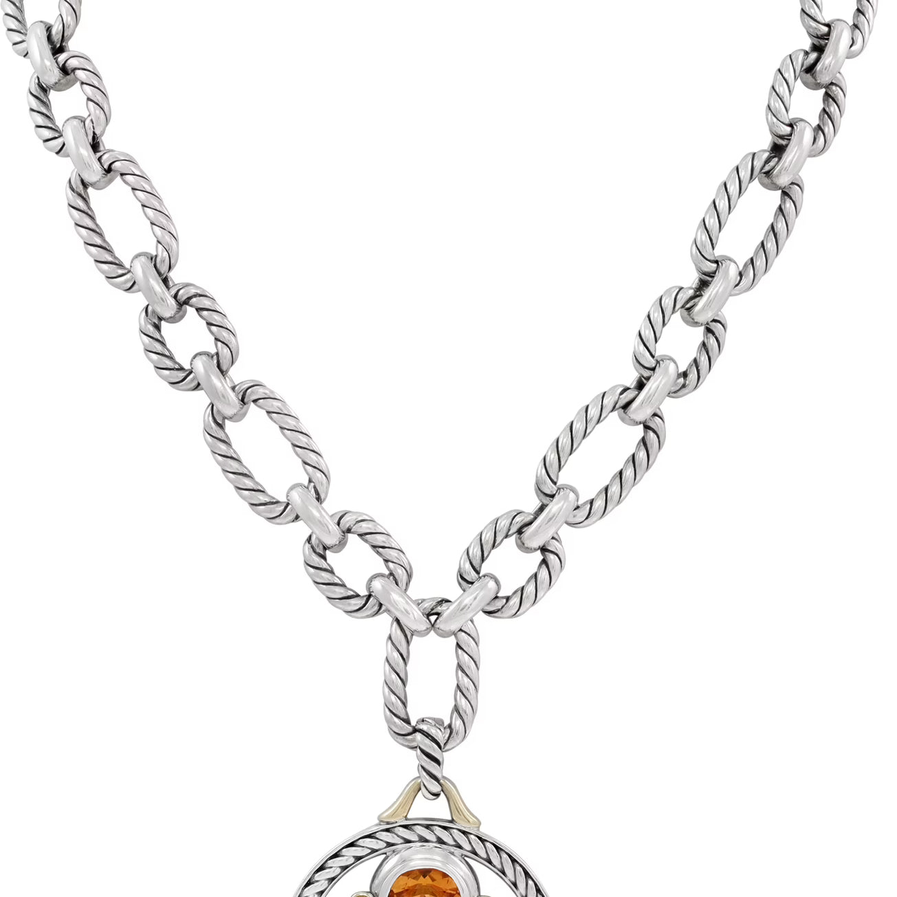 Silver necklace with a pendant featuring gemstones on a white background