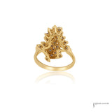 Back of diamond cluster ring with open 14K yellow gold gallery
