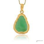 Back of jade Buddha pendant with open gold frame and 14K stamps on frame and bail