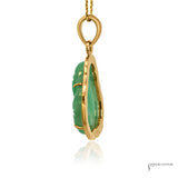 Jade Buddha pendant side profile showing carved jade depth, gold claw prongs and bail