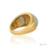 Estate jadeite and diamond dome ring in 14K yellow gold showing hammered inside gallery, angled view