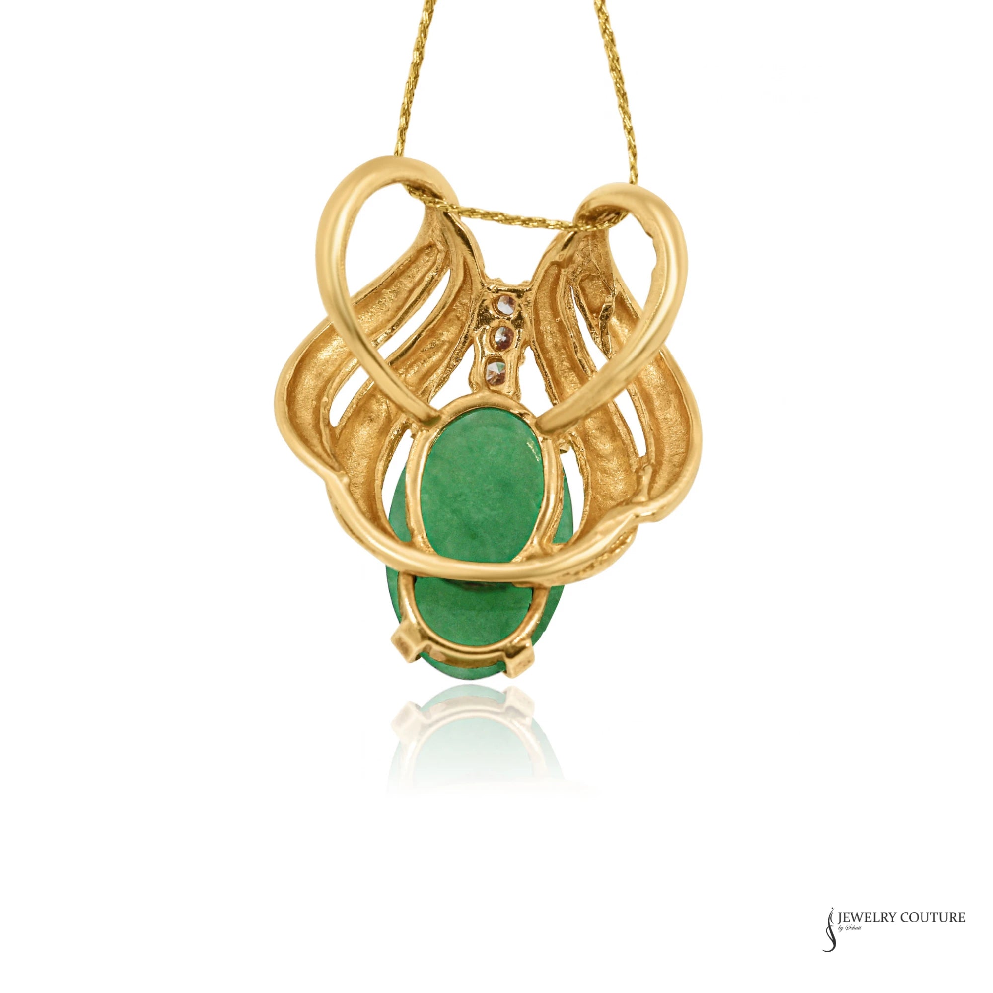 Back of estate jadeite and diamond pendant showing 14K gold slide loops and open gallery