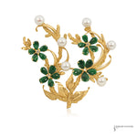 Estate 14K yellow gold floral brooch with green jadeite flowers, diamond centers and pearls