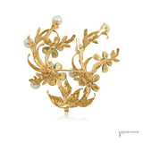 Back of estate 14K gold jadeite and pearl floral brooch showing pin closure