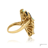 Side profile of 14K gold multi-color jade cluster ring showing prong settings and bypass shank