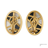Backs of estate 14K gold oval earrings showing omega clip closures