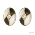 Pair of estate 14K yellow gold oval earrings with mother-of-pearl, black onyx and diamond centers, front view