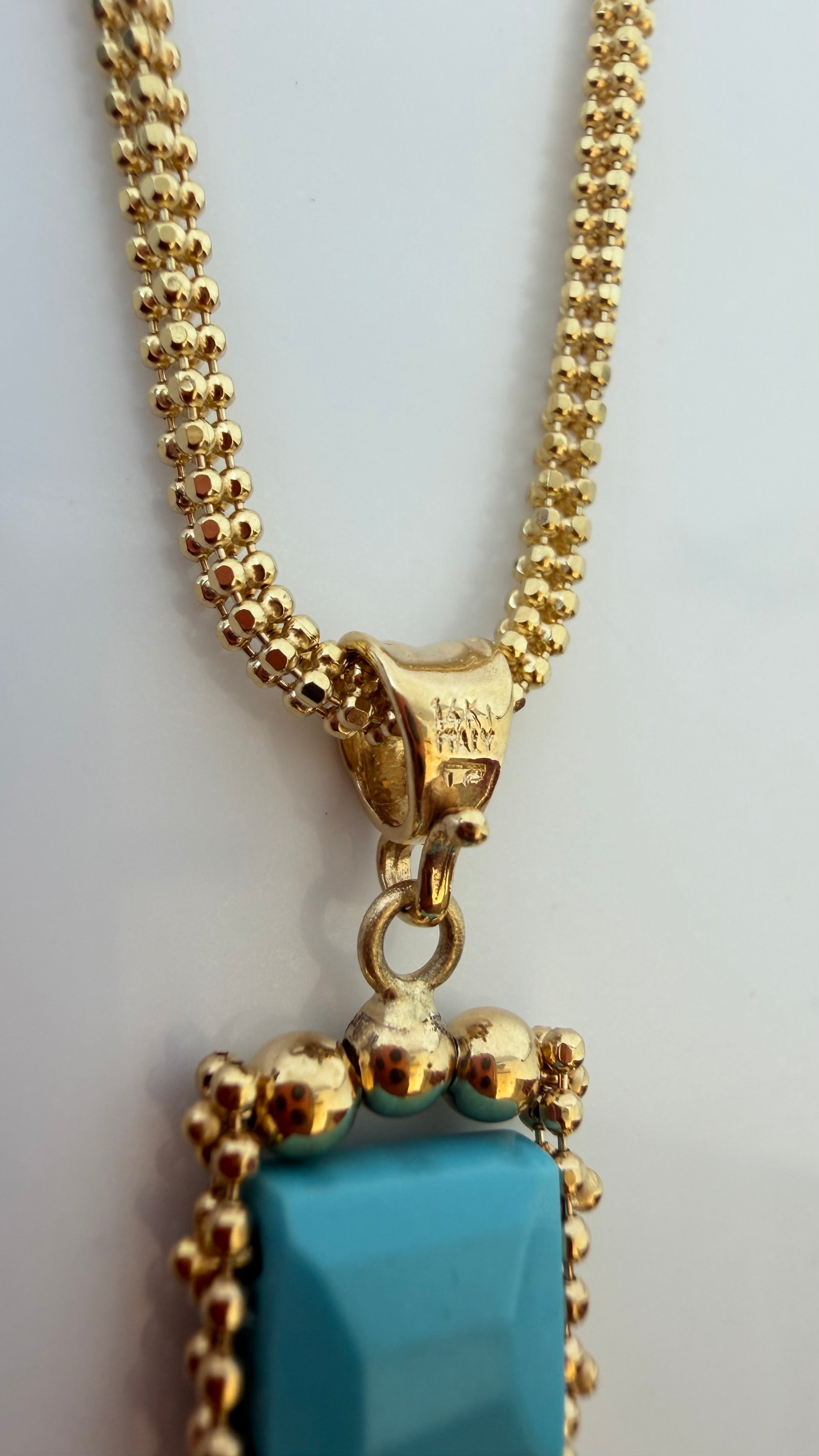 14KT Italy stamp on the bail of the estate turquoise tassel pendant