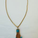 Estate 14K yellow gold turquoise tassel pendant necklace shown full length on its gold bead chain