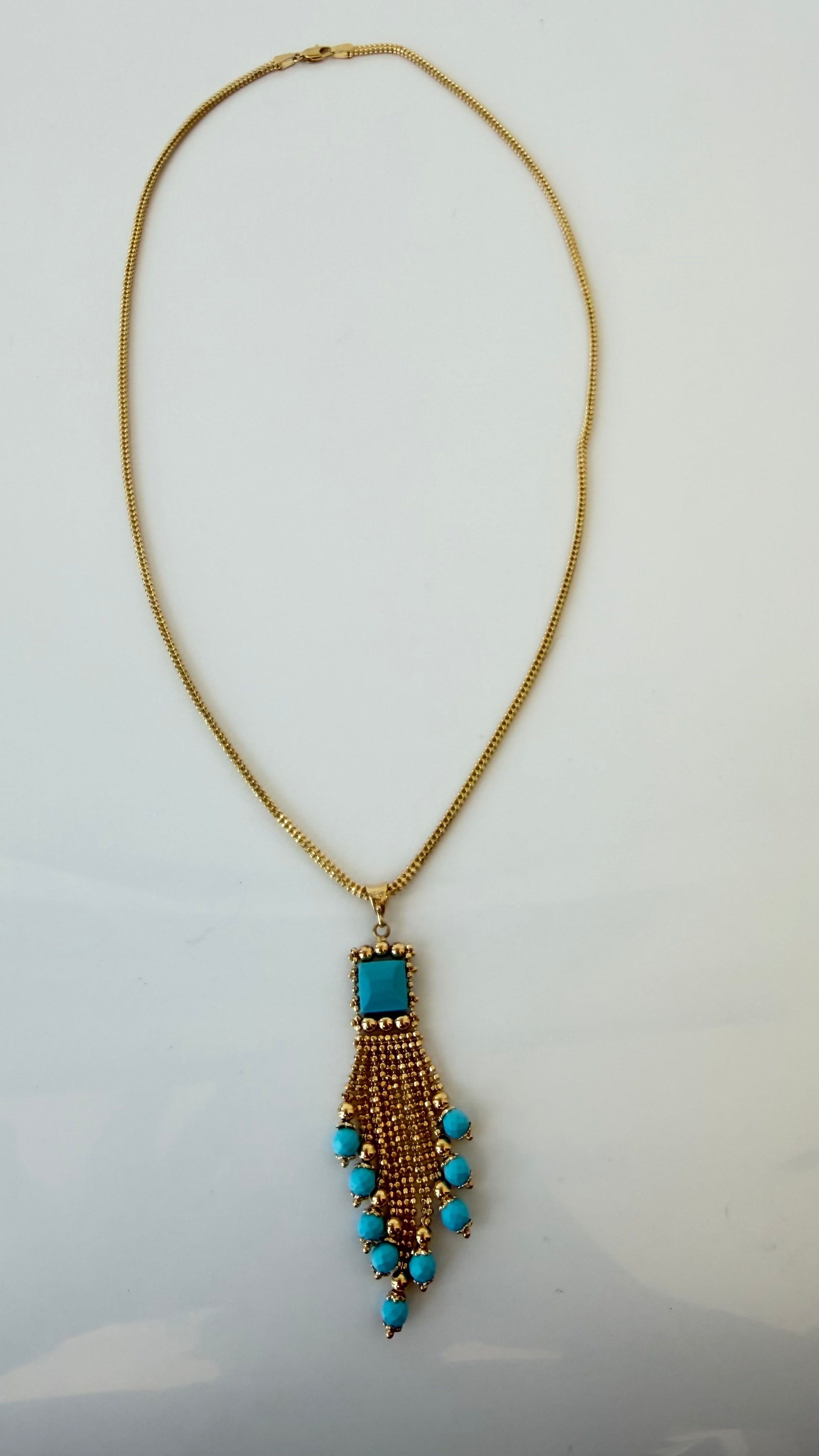 Estate 14K yellow gold turquoise tassel pendant necklace shown full length on its gold bead chain