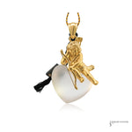 Estate 18K gold cupid frosted crystal heart pendant, angled view
