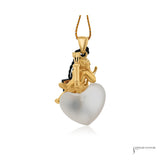 Estate 18K yellow gold cupid pendant on a frosted crystal heart, made in France