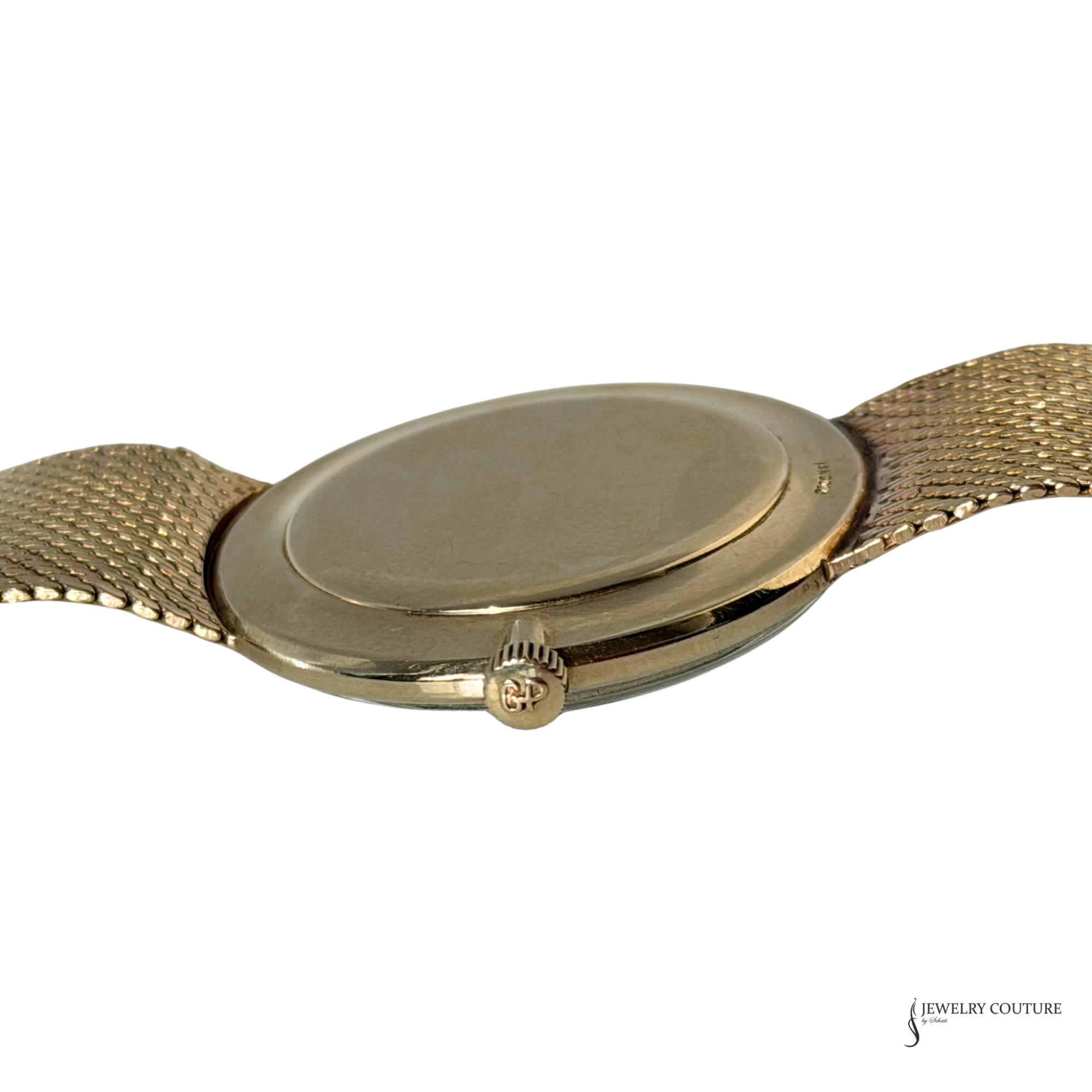 Girard-Perregaux 14K gold case side with GP signed crown