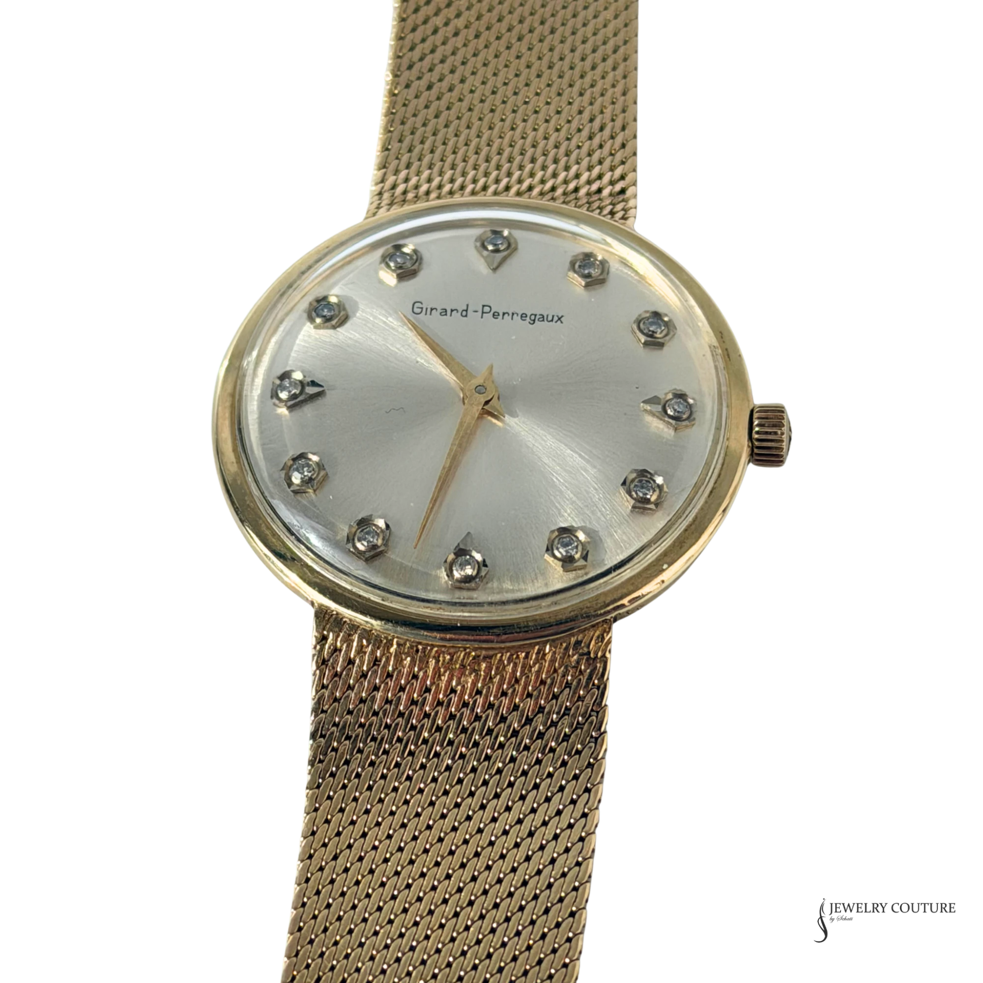 Girard-Perregaux silver sunburst dial with 12 diamond hour markers