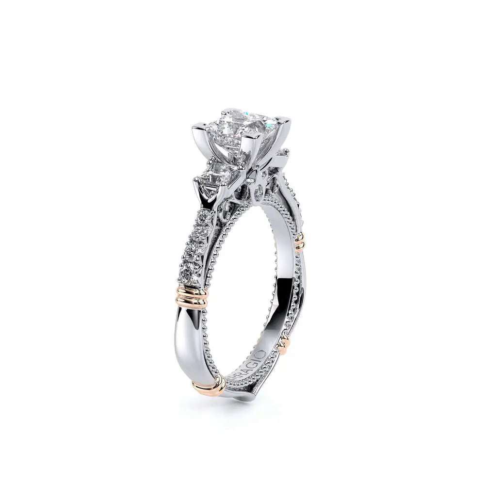 Diamond ring with a white and rose gold band on a white background