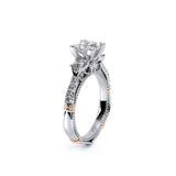 Diamond ring with a white and rose gold band on a white background