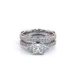 Stack of diamond rings on a white background