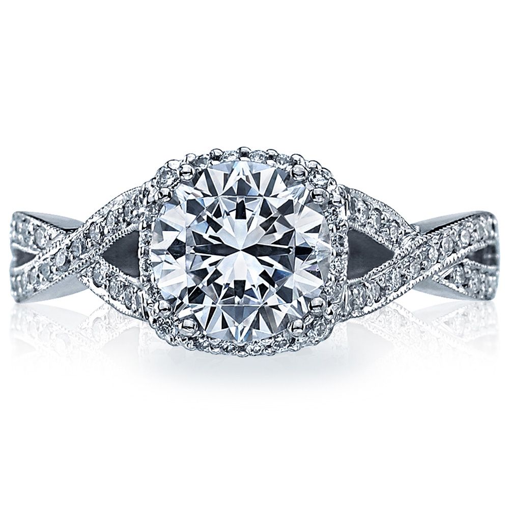 Diamond ring with intricate design on a white background